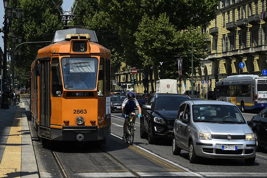 Cyclists, trams and cars compete for space in downtown Turin.Photo by Nicolò Campo/LightRocket via Getty Images