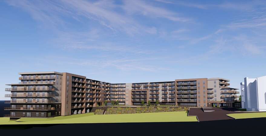 Le futur bâtiment du projet Totem et ses 367 unités, avec le bâtiment de l'ancienne résidence et ses 53 unités, à droite sur la photo.