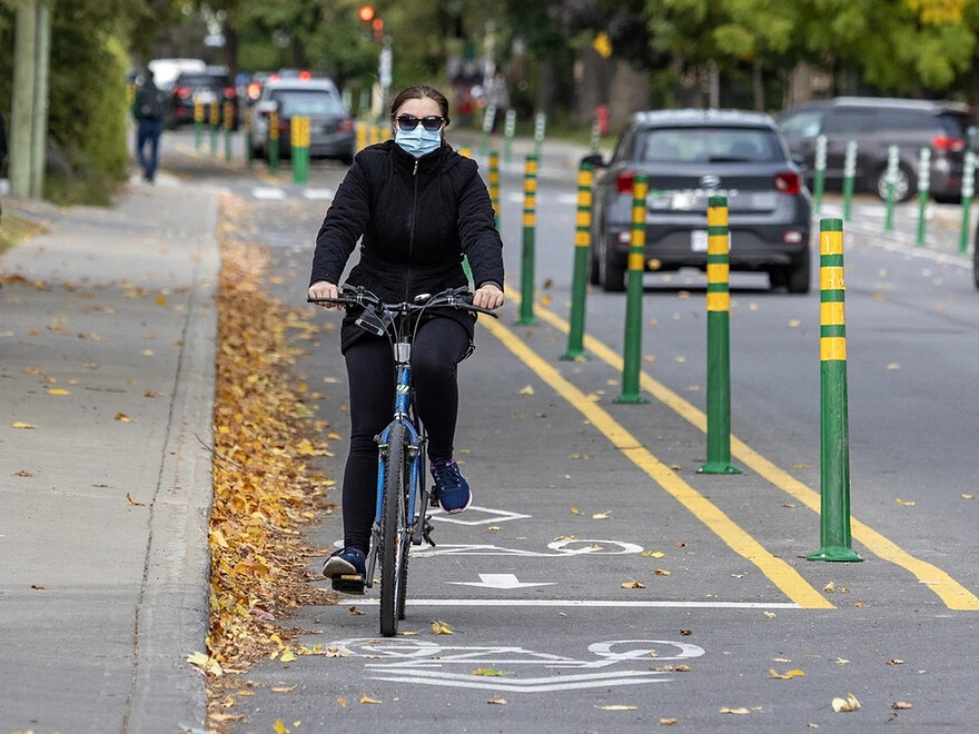 A cyclist rides on the bike path on Terrebonne Ave. in Montreal Wednesday Oct. 9, 2024. Photo by John Mahoney /Montreal Gazette