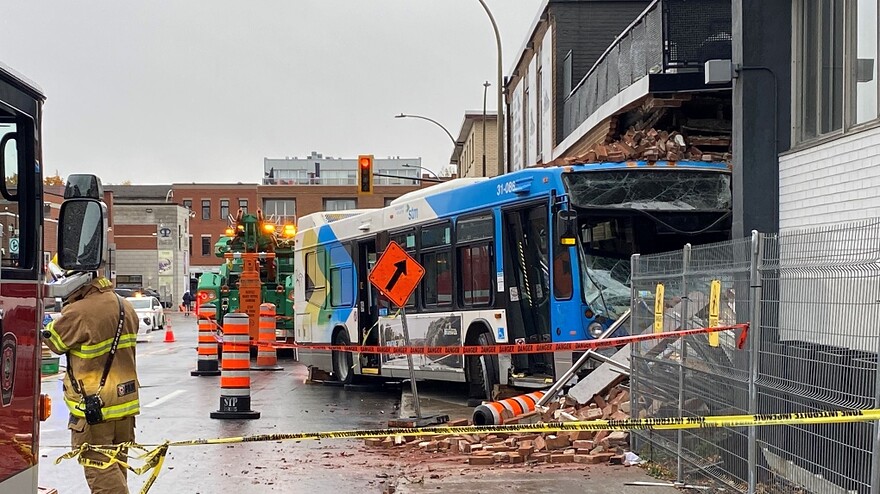 A Montreal bus crashed into a building in the Little Italy neighbourhood on Oct. 20, 2022. (CTV News/Kelly Greig)
