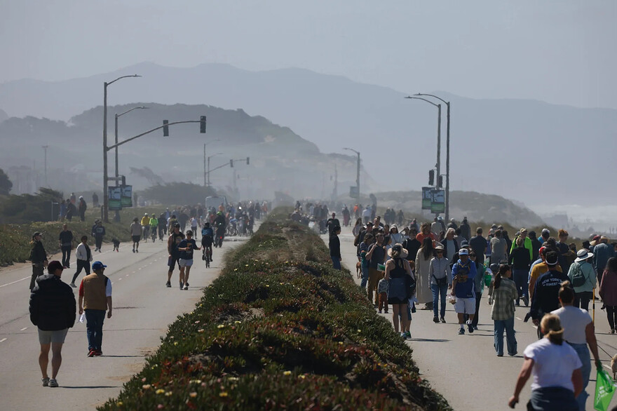 Visitors pack the former Great Highway during the grand opening of the Sunset Dunes Park in San Francisco on April 12. Photographer: Stephen Lam/San Francisco Chronicle via Getty Images