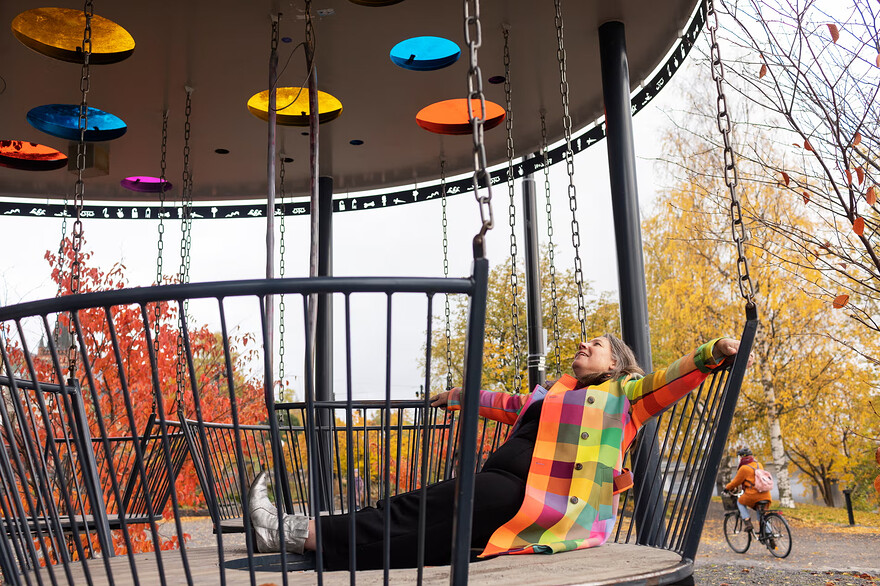 Groskop reclines on Frizon in Årstidernas park – social seating designed it in collaboration with local teenage girls. Photograph: Elin Berge