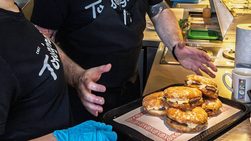 Bernie Beigne and Chez Tousignant teamed up to create a hamburger with a doughnut as the bun, in Montreal on Thursday May 29, 2025. Dave Sidaway Montreal Gazette