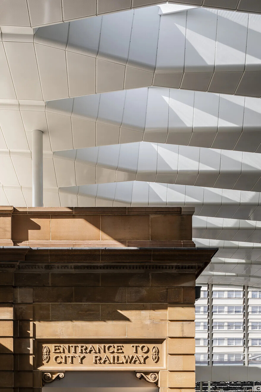 One of the architects’ biggest tasks: fusing older structures with new elements, like the ceiling’s modules, manufactured in Newcastle and shipped to Sydney.Photographer: Trevor Mein