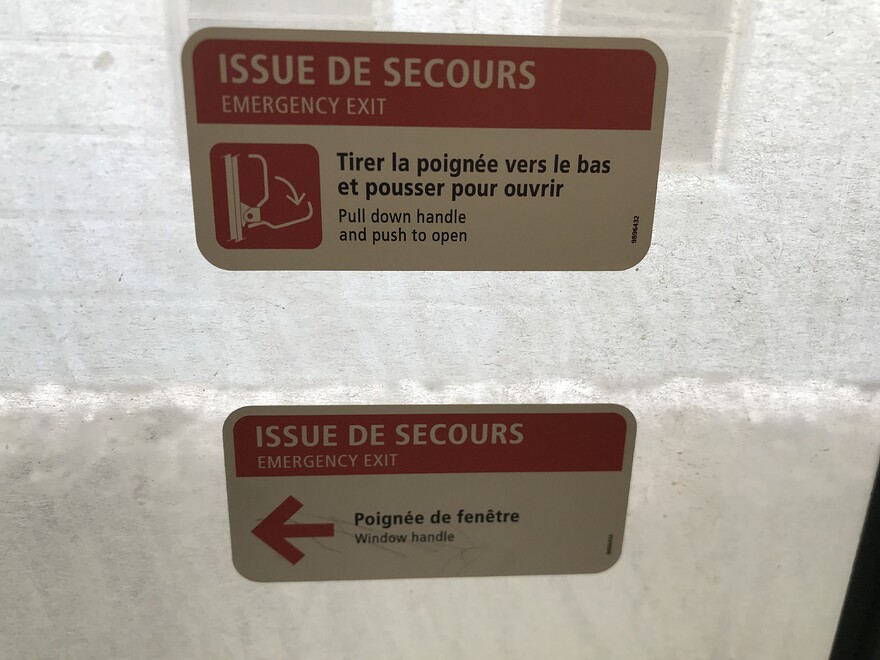 Autocollants—issue de secours