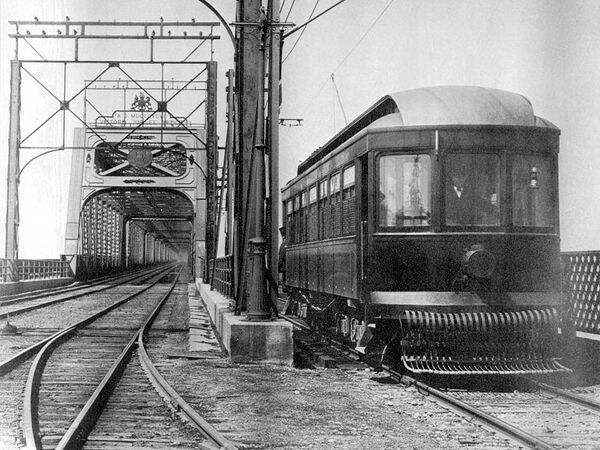 Montreal and Southern Counties streetcar descending from the side of Victoria Bridge.