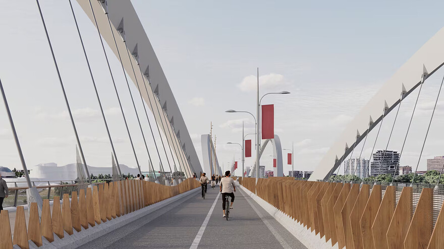 The cycleway provides a smooth, straight route across the river, where a concrete safety barrier keeps cyclists separated from vehicles. (NCC)