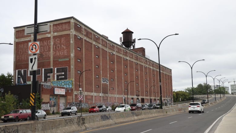 Van Horne warehouse by the highway