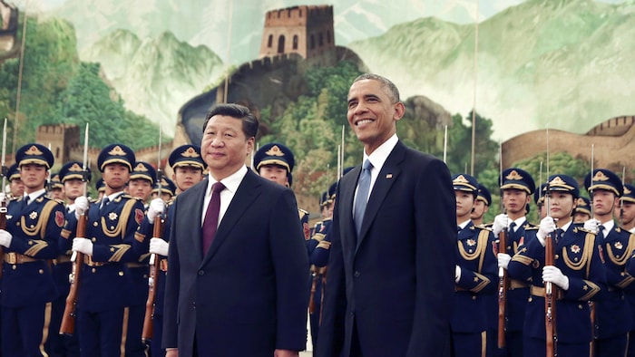 Le président américain Barack Obama lors d'une cérémonie de bienvenue organisée par le président chinois Xi Jinping au Grand Hall du Peuple à Pékin, en novembre 2014.