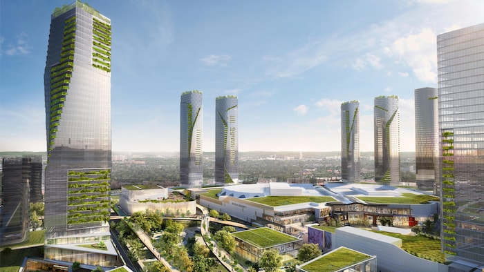 Un dessin représentant le projet Royalmount avec sept grandes tours autour de grands complexes et de quelques espaces verts.