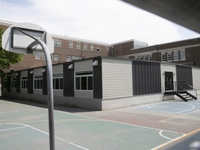 Académie Saint-Clément was built for 350 students, but had 600 last year. Many students are in mobile classrooms that take away schoolyard space.
