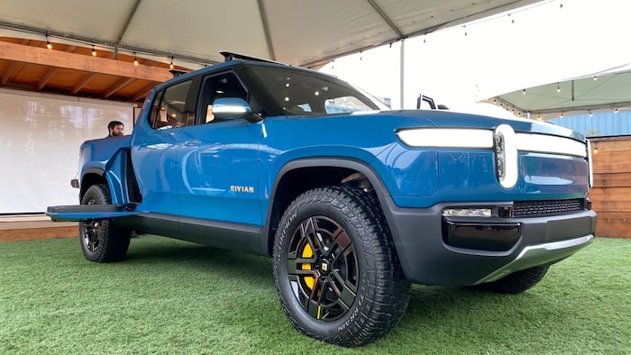 Even though they are electric, larger trucks and SUVs like this Rivian R1T mean they are not environmentally friendly to manufacture, and their large batteries make them heavier and harder on roads, say urban planners. (Nathan Frandino/Reuters)