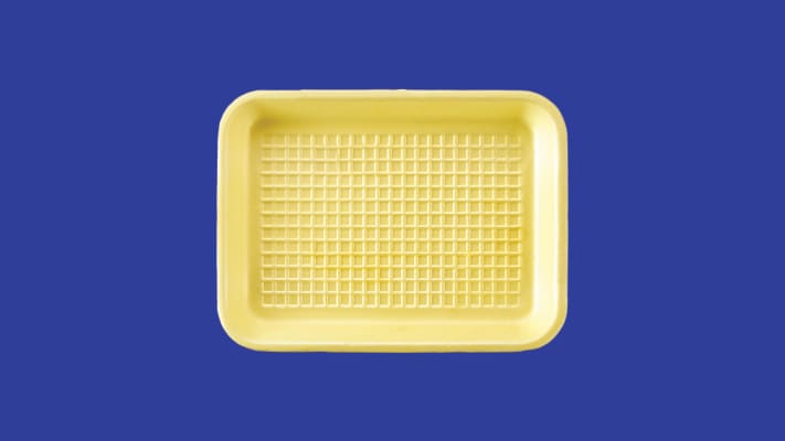 Empty yellow styrofoam meat tray
