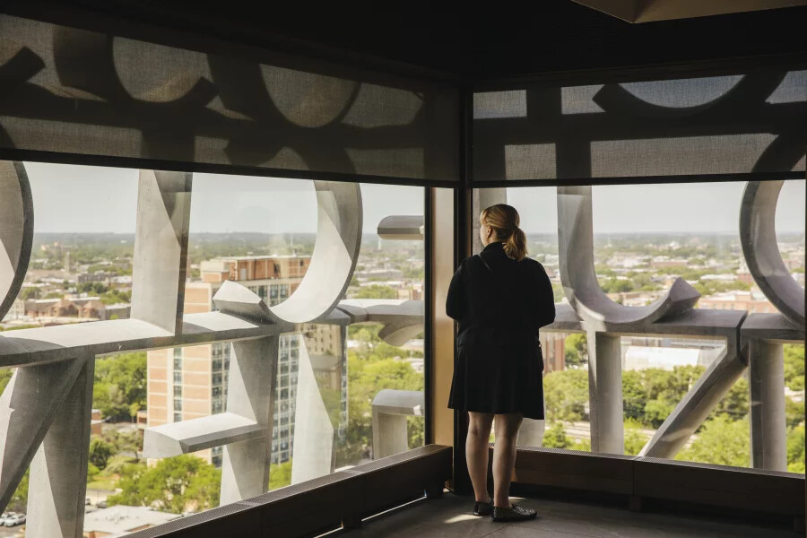 In The Sky Room, visitors can look through the text on the facade of the building to view Chicago's South and West Side neighborhoods. - Lucy Hewett for NPR