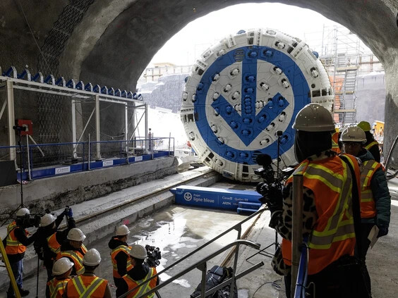Painted white with the métro system's blue arrow surrounded by a circle, the métro's tunnel-boring machine is seen at the future Vertières station on Jean-Talon St. in St-Léonard on Monday, Feb. 23, 2026. Photo by Pierre Obendrauf /Montreal Gazette