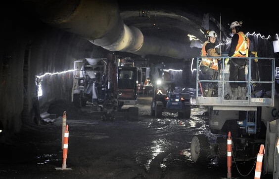 Workers are seen in the tunnel being excavated for the Blue Line métro extension on Monday, Feb. 23, 2026 at the Vertières metro station. Photo by Pierre Obendrauf /Montreal Gazette